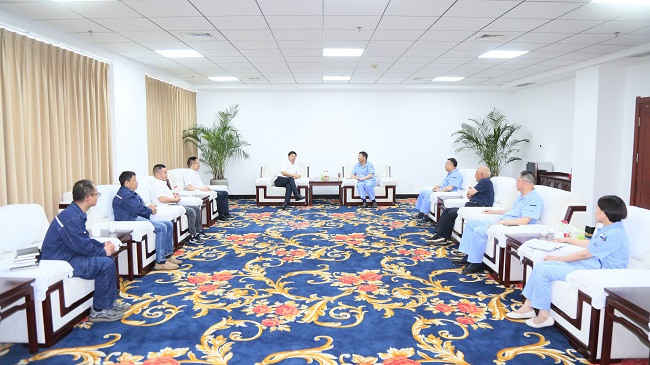 中電建河南工程有限公司黨委書記、董事長劉長龍一行到萬基控股集團交流訪談